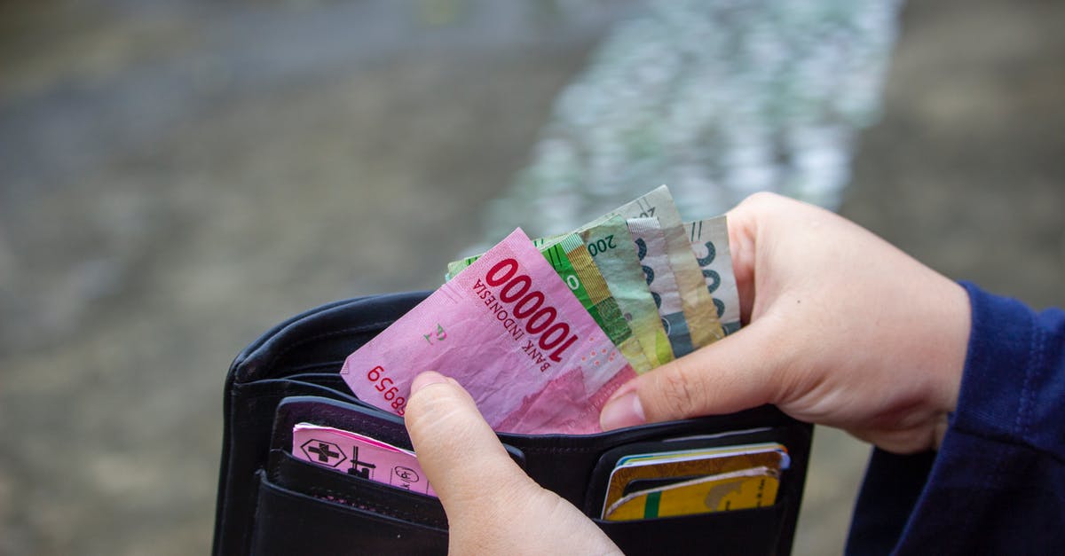 What is an easy way to get money in Splatoon 2? - A Person Getting Money on a Wallet What is an easy way to get money in Splatoon 2? - A Person Getting Money on a Wallet