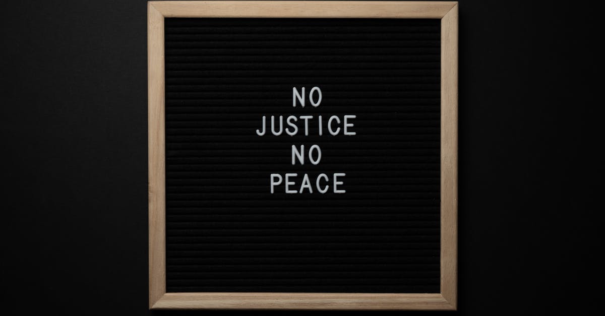 What is diplomatic "threat", and how do I change it - Overhead view of white inscription on center of chalkboard located on black background