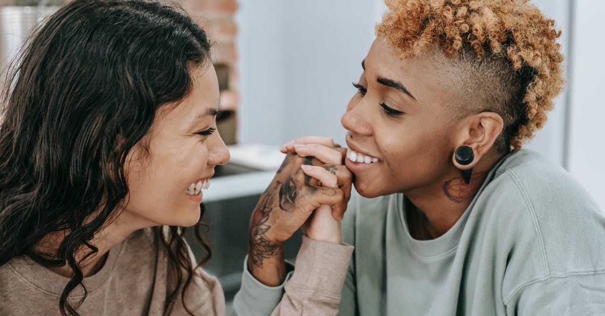 What is Dutch's relationship to Boomer? - Loving lesbian couple admiring each other What is Dutch's relationship to Boomer? - Loving lesbian couple admiring each other