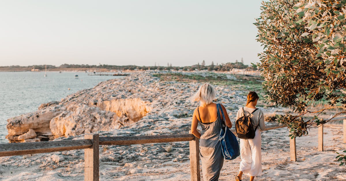 What is going to happen to HHA? - Two Women are Walking Away From Sandy Beach at Sunset What is going to happen to HHA? - Two Women are Walking Away From Sandy Beach at Sunset