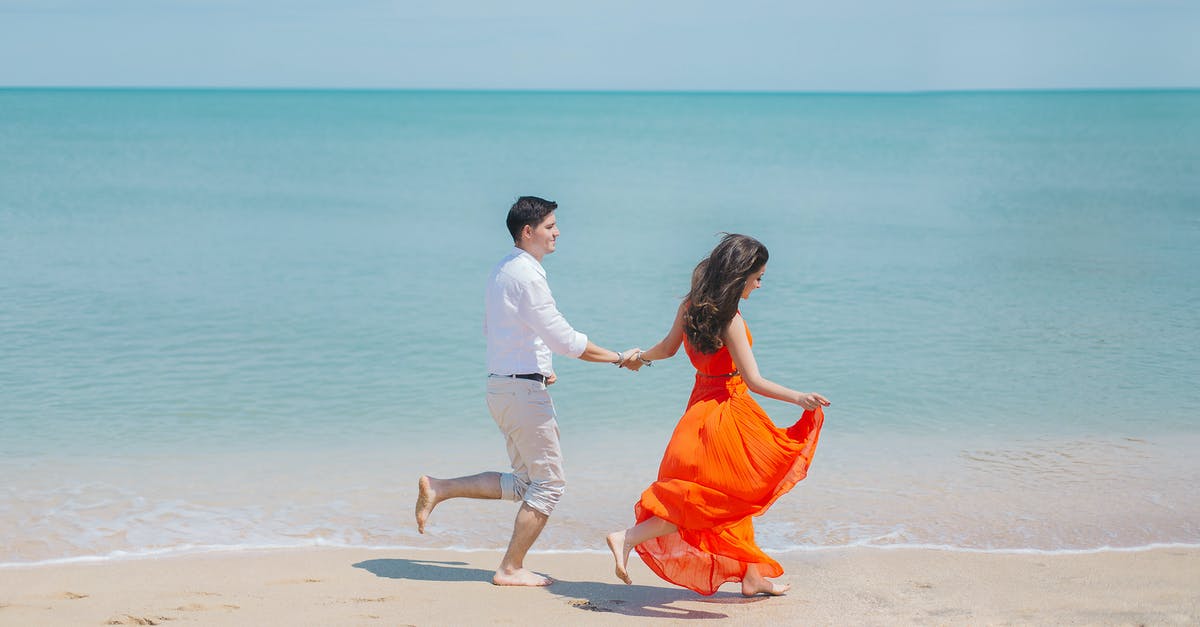 What is killing me? - Man and Woman Walks Beside Green Sea What is killing me? - Man and Woman Walks Beside Green Sea
