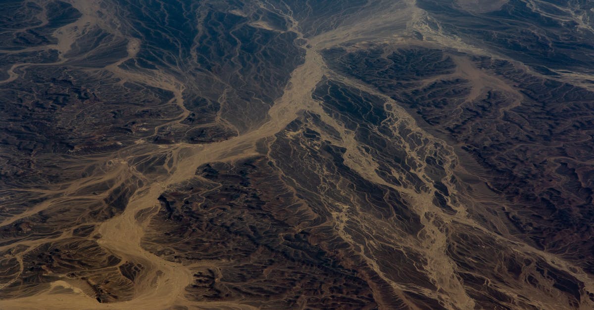 What is new in the Director's Cut of Wasteland 2? - Aerial View of Road Between Mountains What is new in the Director's Cut of Wasteland 2? - Aerial View of Road Between Mountains