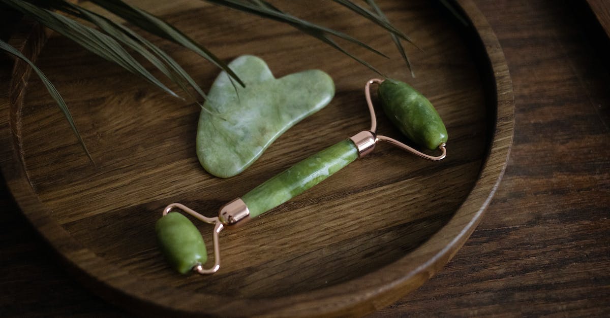 What is skin boost? - Elegant Cosmetic Tools for Skin Massage Lying on Wooden Table What is skin boost? - Elegant Cosmetic Tools for Skin Massage Lying on Wooden Table