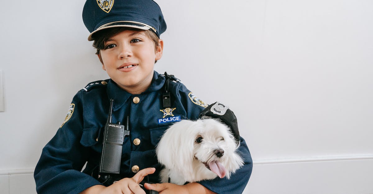 What is the benefit of employing a bitizen in their dream job? - Photo of a Boy in a Police Costume Sitting Beside a White Dog What is the benefit of employing a bitizen in their dream job? - Photo of a Boy in a Police Costume Sitting Beside a White Dog