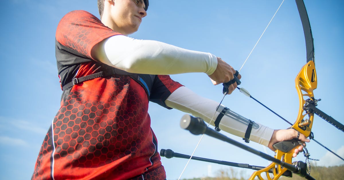 What is the best angle for an enderpearl if I am aiming for distance? - Archer holding archery Sports Equipment