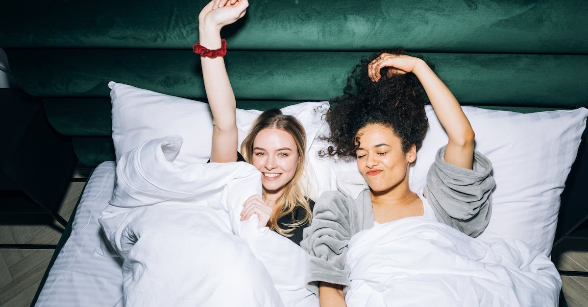 What is the best time for ascension? - Two Young Women Lying on White Bed What is the best time for ascension? - Two Young Women Lying on White Bed
