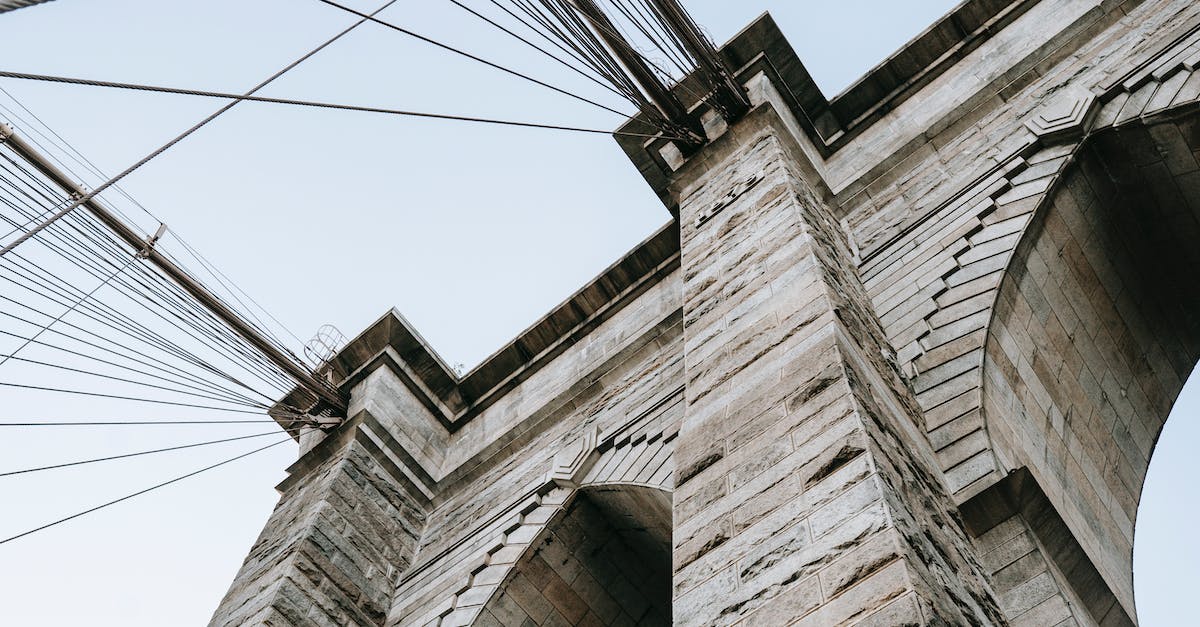 What is the best way to obtain a ridiculously high score in Goat City Bay? - From below of brick elements on structure with cables on Brooklyn bridge against clear sky What is the best way to obtain a ridiculously high score in Goat City Bay? - From below of brick elements on structure with cables on Brooklyn bridge against clear sky