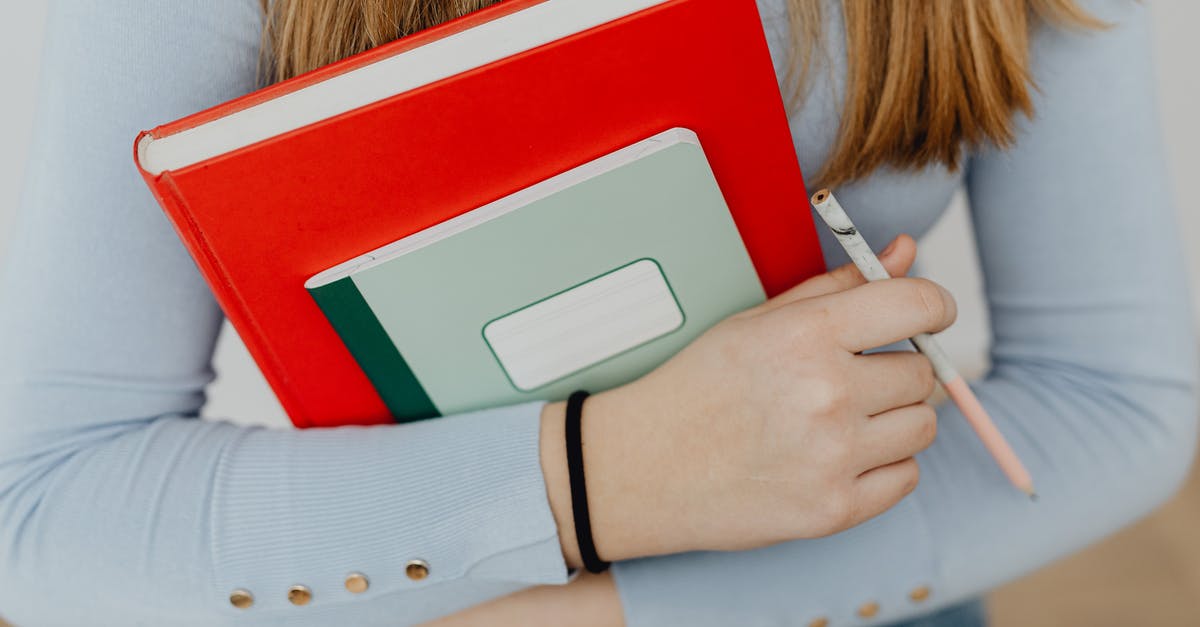 What is the best way to start beginner minecrafters learning commands? [closed] - Girl Holding Notebooks and Pencil