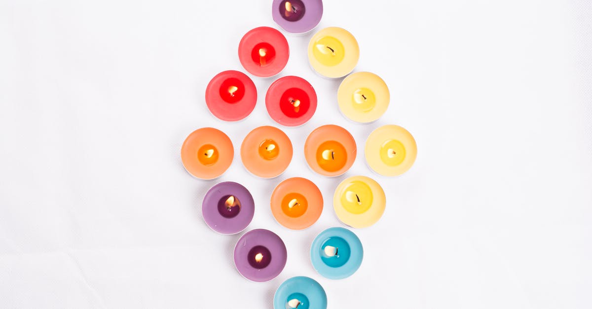 What is the blue candle buff/de buff? - Assorted-color Lighted Candles on White Surface What is the blue candle buff/de buff? - Assorted-color Lighted Candles on White Surface