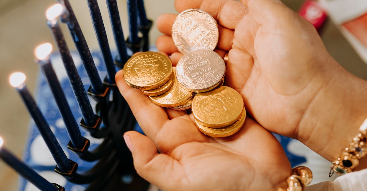 What is the blue candle buff/de buff? - Photo Of Person Holding Gold Round Coins What is the blue candle buff/de buff? - Photo Of Person Holding Gold Round Coins