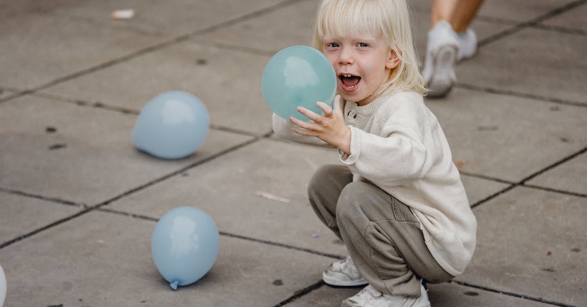 What is the blue/grey balloon on Happy Street? - Excited girl with colorful balloons What is the blue/grey balloon on Happy Street? - Excited girl with colorful balloons