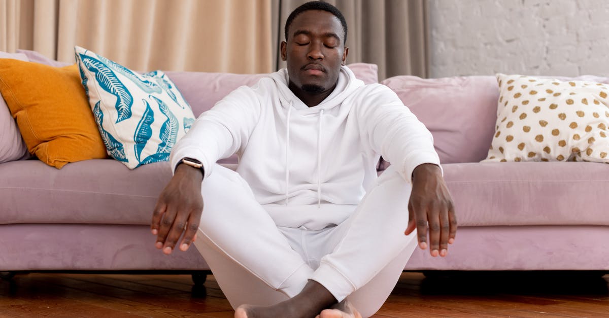 What is the chance of a Sacrifice Room to appear on a floor? - Calm African American male in white clothes sitting with closed eyes and crossed legs on floor against comfortable sofa in living room What is the chance of a Sacrifice Room to appear on a floor? - Calm African American male in white clothes sitting with closed eyes and crossed legs on floor against comfortable sofa in living room