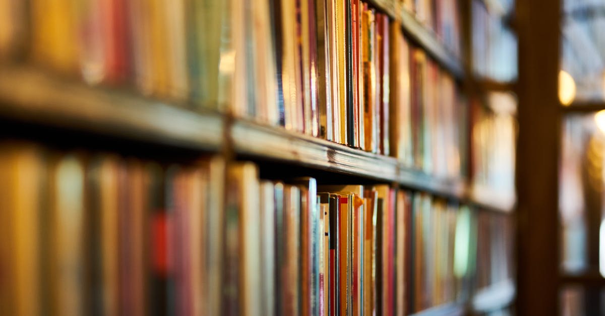 What is the chronological order of all the FNAF games (and book)? [duplicate] - Selective Focus Photography of Brown Wooden Book Shelf