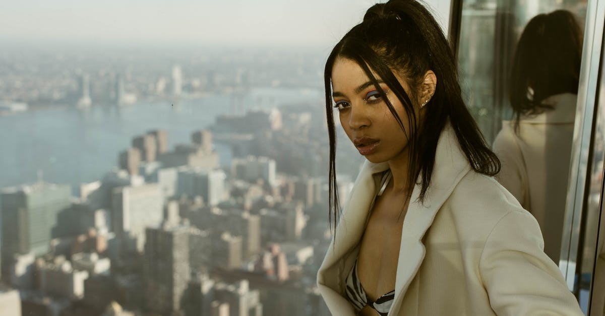 What is the city on top of Sin? - Woman Standing on Top of What is the city on top of Sin? - Woman Standing on Top of