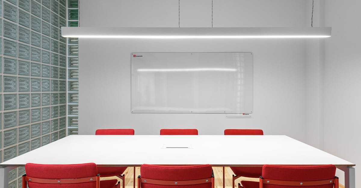 What is the command for placing red wool? - Interior of office with white table near red stools and whiteboard on wall near lamp and glass wall What is the command for placing red wool? - Interior of office with white table near red stools and whiteboard on wall near lamp and glass wall