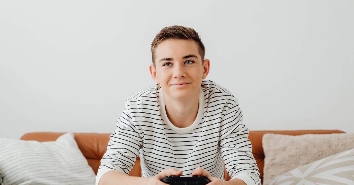 What is the console command to skip quests? - Happy Guy Playing Console at Home