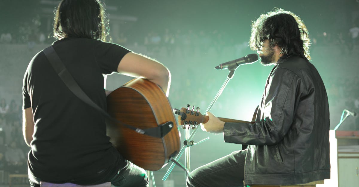 What is the console command(s) to modify the lockpicking skill? - Male musicians with guitars performing on concert