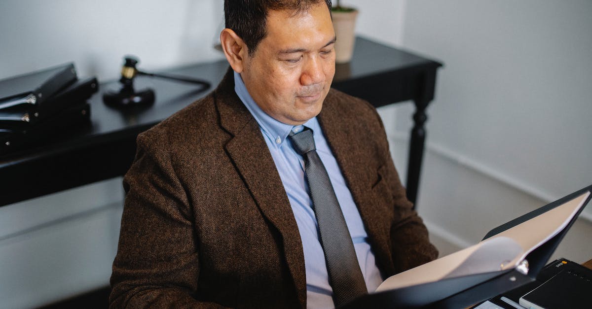 What is the data tag used to check success on a command block? - Pensive Asian lawyer examining report in office What is the data tag used to check success on a command block? - Pensive Asian lawyer examining report in office