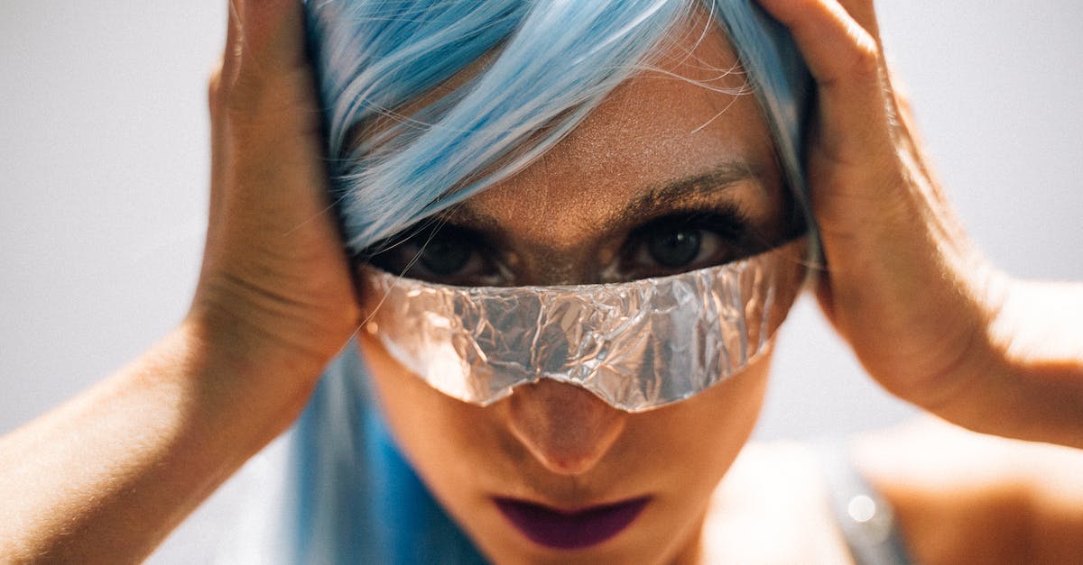 What is the difference between Cyberpunk and Futuristic games (scenario based)? [closed] - Portrait of a Woman Dressed in a Futuristic Costume