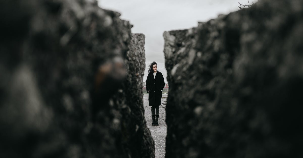What is the difference between DirectX 11 and 12? - Woman Standing between Rocks