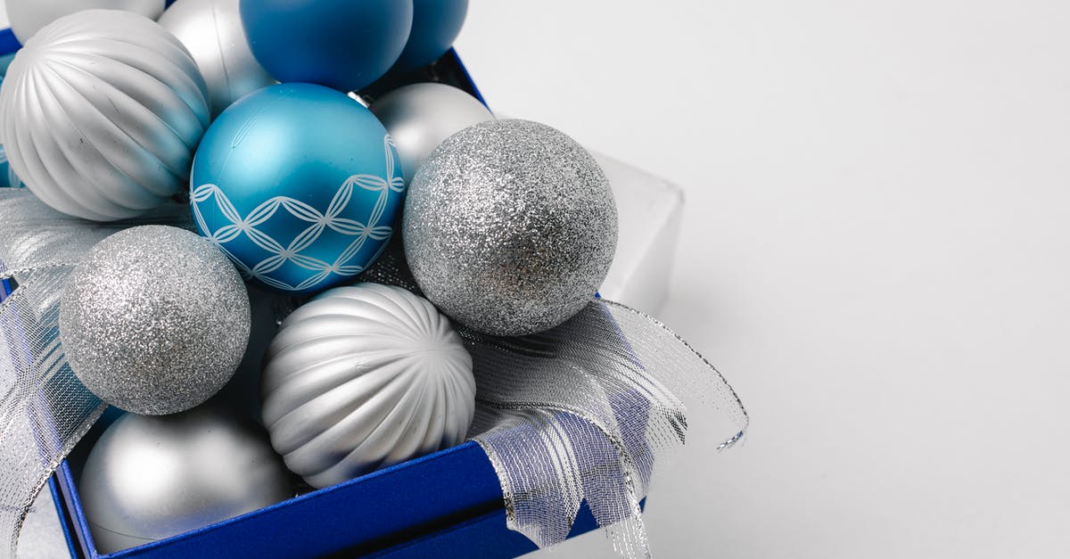 What is the difference between normal and special edition? - Festive sparkling silver and blue baubles in box