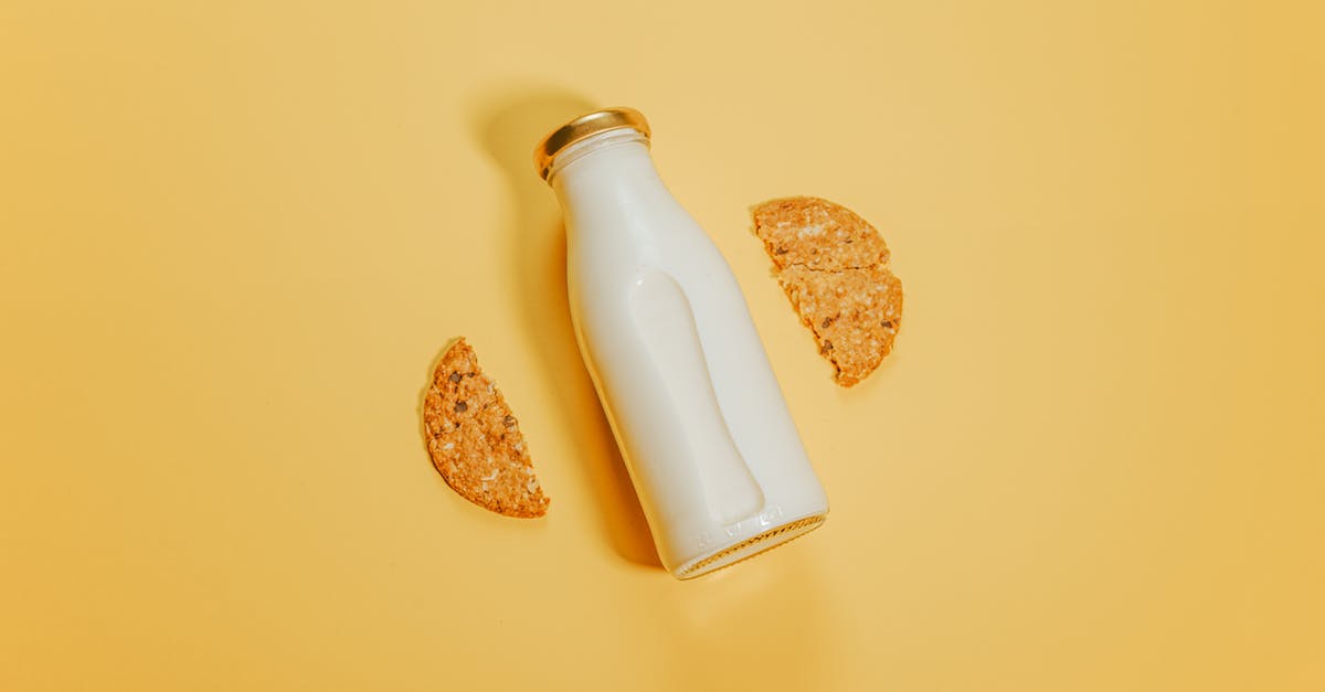 What is the difference between "MK-V" and standard parts? - Bottle of milk with cookies on surface