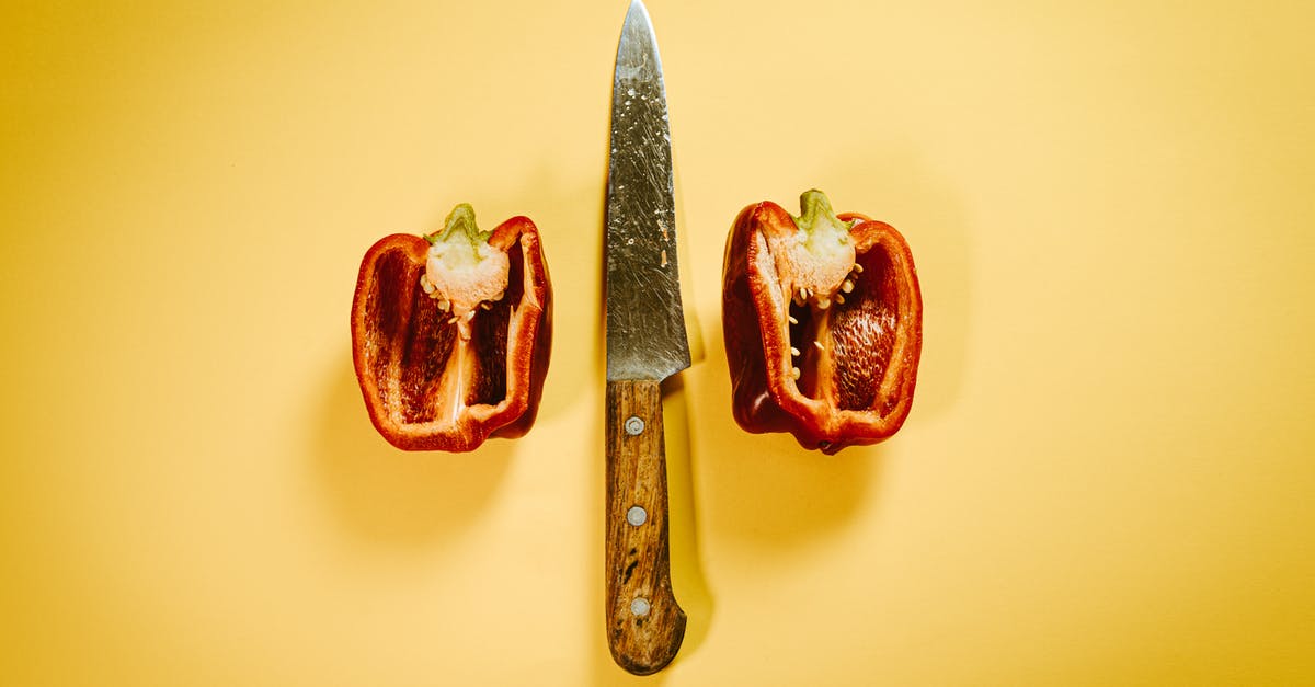 What is the difference between "MK-V" and standard parts? - Cut red bell pepper with knife on surface