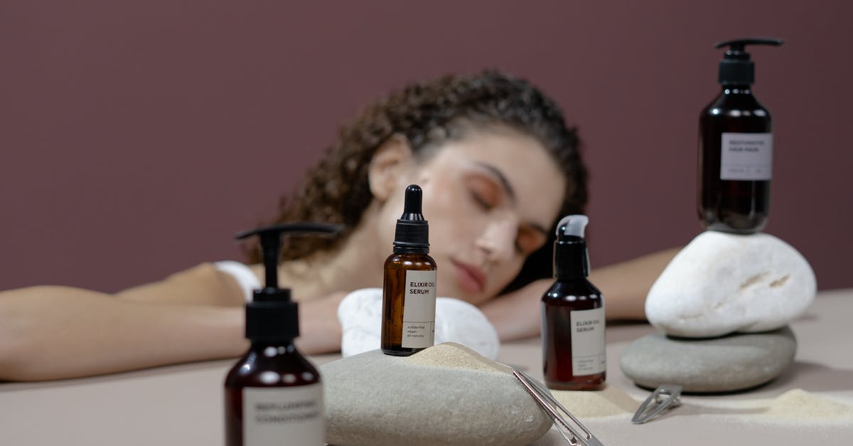 What is the duration of the effects that the mysterious serum gives? - Woman in Brown and Black Leopard Print Shirt Sitting Beside Table With Bottles and White Ceramic