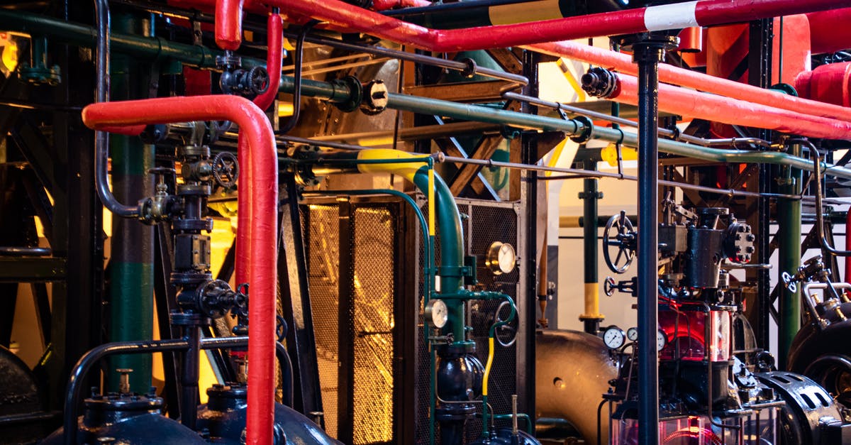 What is the effect of increasing the power budget vs building a new power plant? - Red and Gray Industrial Machinery
