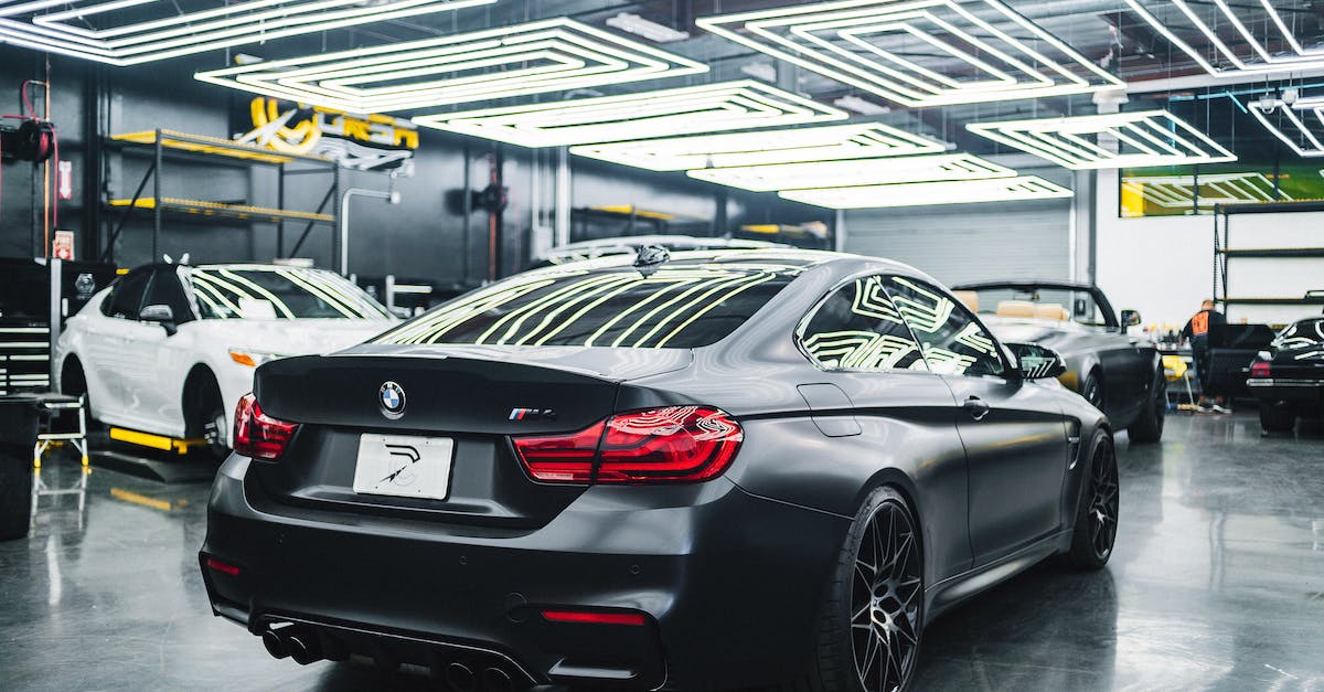What is the effect of increasing the power budget vs building a new power plant? - Black car parked in modern garage