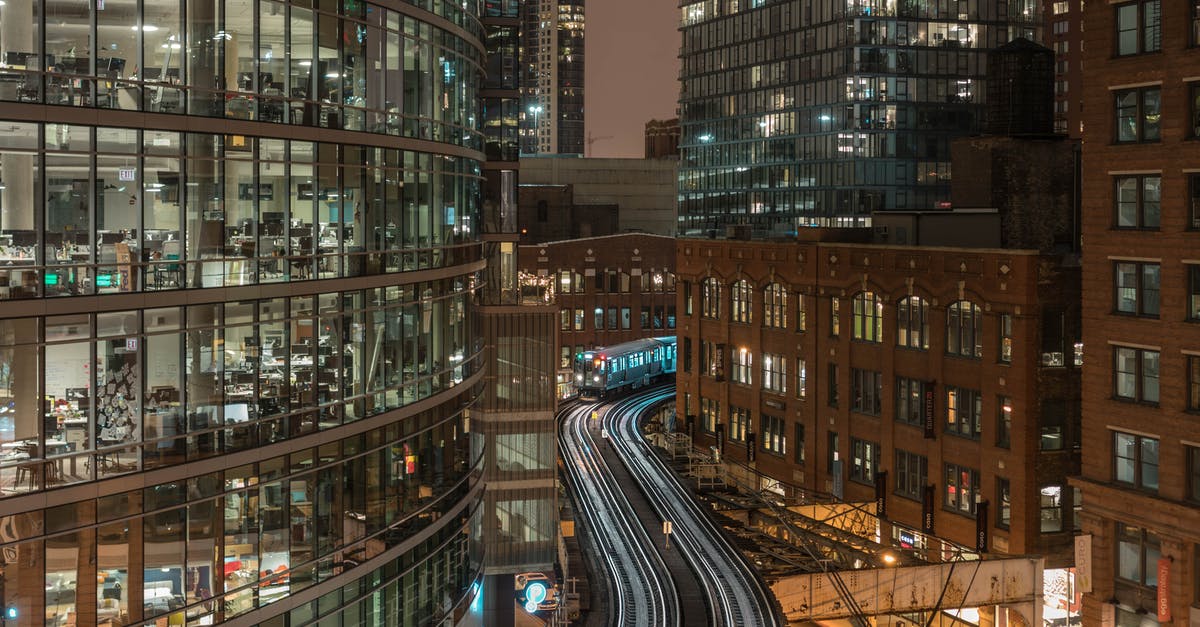 What is the fastest vehicle setup from the Catch-A-Ride? - Exteriors of modern illuminated glass buildings in downtown at night What is the fastest vehicle setup from the Catch-A-Ride? - Exteriors of modern illuminated glass buildings in downtown at night