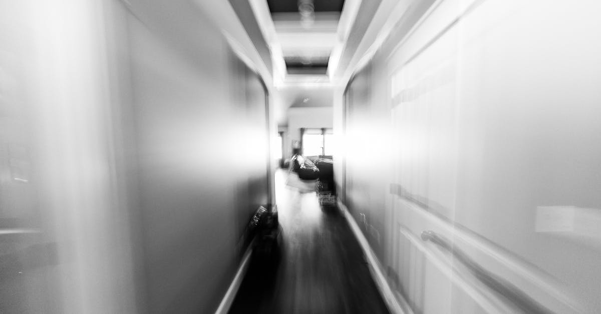 What is the fastest way to get 99 extra lives? - Black and white empty narrow hall between white walls leading to living room of contemporary house What is the fastest way to get 99 extra lives? - Black and white empty narrow hall between white walls leading to living room of contemporary house