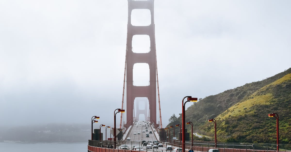 What is the fastest way to get money in GTA San Andreas? - Golden Gate Bridge with cars driving on roadway along green hills in dense fog What is the fastest way to get money in GTA San Andreas? - Golden Gate Bridge with cars driving on roadway along green hills in dense fog