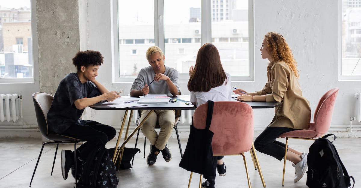 What is the full research tree? - Diverse students discussing project at table