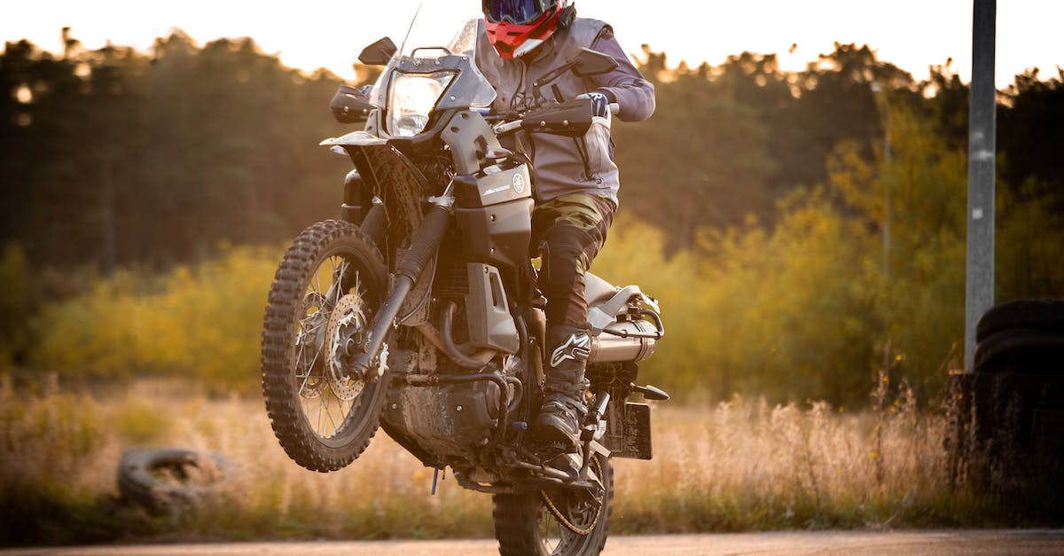 What is the highest speed possible? - Man in Black and White Motorcycle Suit Riding Motorcycle What is the highest speed possible? - Man in Black and White Motorcycle Suit Riding Motorcycle