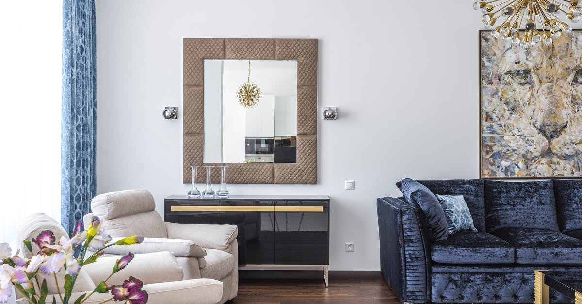 What is the image under the curtain in God of War? - Cozy living room in modern apartment