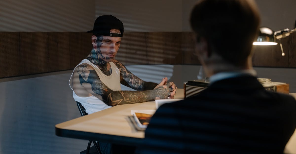 What is the item required when interrogating the Regent's Envoy? - Man in Black Suit Sitting Beside Woman in Brown and White Long Sleeve Shirt What is the item required when interrogating the Regent's Envoy? - Man in Black Suit Sitting Beside Woman in Brown and White Long Sleeve Shirt