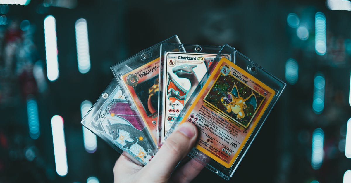 What is the legality of Pokemon showdown? [closed] - A Person Holding Pokemon Trading Cards