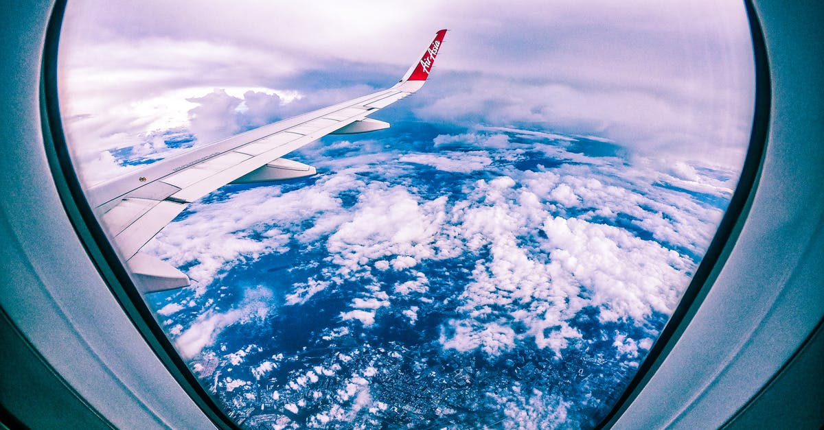 What is the max altitude of generated terrain? - Wide angle of rocky ground through cloudy sky and plane wing from window of aircraft