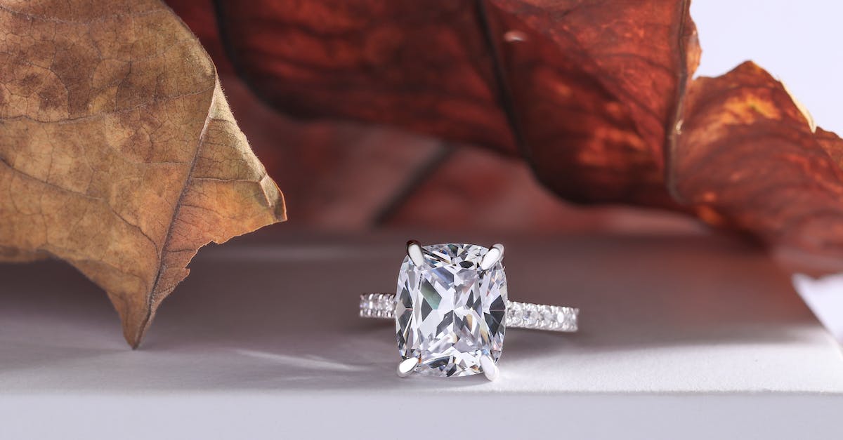 What is the maximum amount of diamonds in one vein? - Silver Diamond Ring on White Surface What is the maximum amount of diamonds in one vein? - Silver Diamond Ring on White Surface