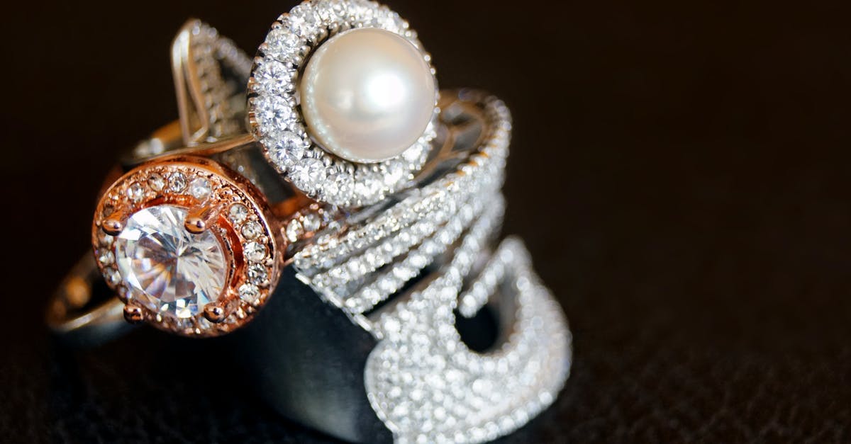 What is the maximum amount of diamonds in one vein? - Silver-colored Ring With Clear Gemstone and White Pearl What is the maximum amount of diamonds in one vein? - Silver-colored Ring With Clear Gemstone and White Pearl