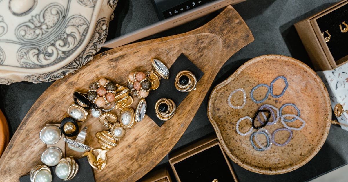 What is the maximum amount of gold you can store in your wallet? - Gemstones and Jewelries on a Wooden Tray What is the maximum amount of gold you can store in your wallet? - Gemstones and Jewelries on a Wooden Tray