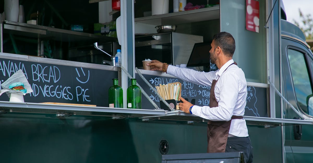 What is the maximum server View-Distance? - Waiter preparing food truck for service in park