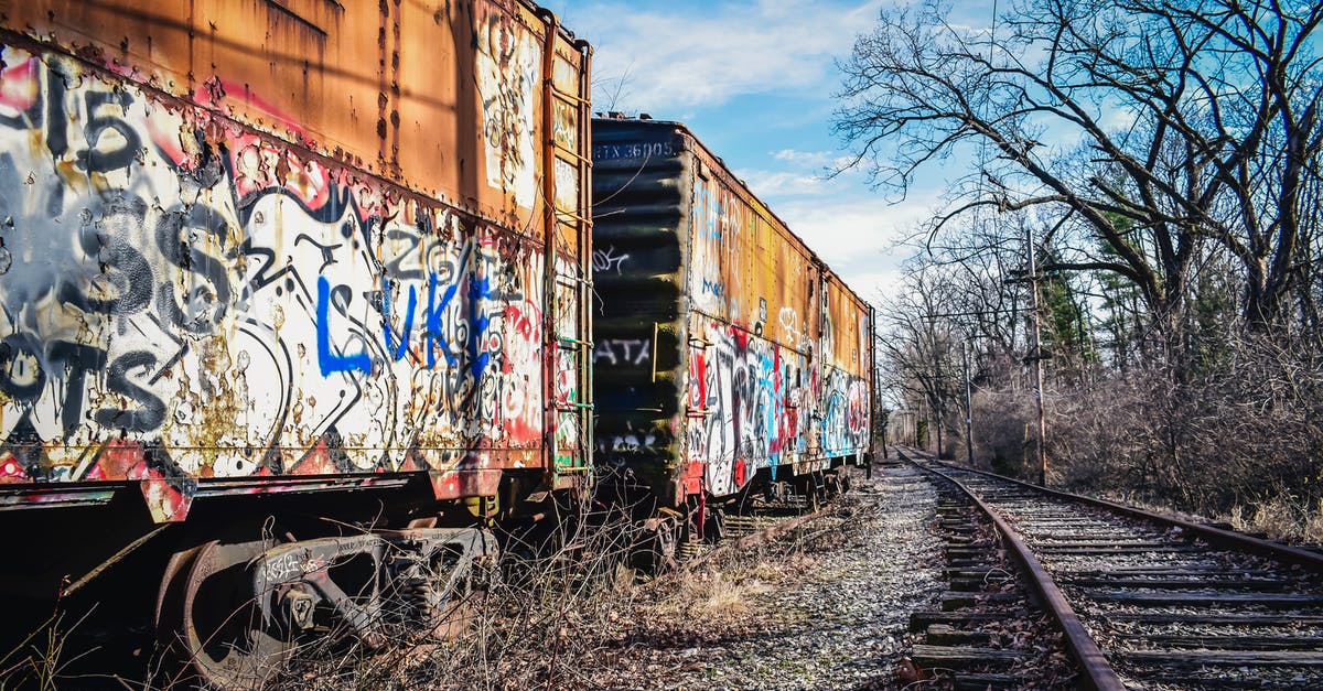 What is the most efficient way to use incense? - Old railway carriages with graffiti on surface under cloudy sky What is the most efficient way to use incense? - Old railway carriages with graffiti on surface under cloudy sky