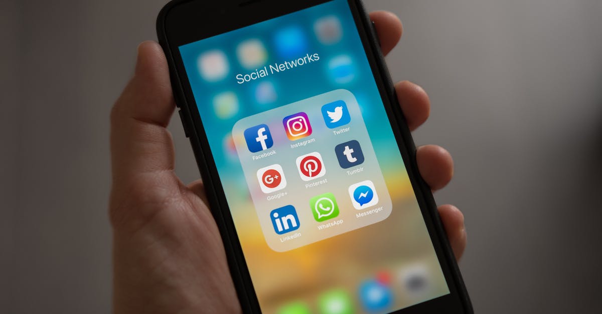What is the Most Score Anyone has Ever Gotten on Google Cricket - Person Holding Iphone Showing Social Networks Folder