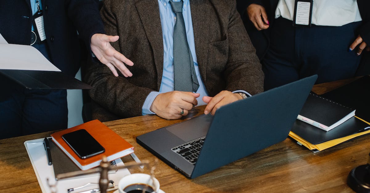 What is the optimal strategy for the launched site in Stack Egg? - Crop faceless diverse colleagues in formal suits gathering around table with laptop and stack of documents and negotiating about business strategy What is the optimal strategy for the launched site in Stack Egg? - Crop faceless diverse colleagues in formal suits gathering around table with laptop and stack of documents and negotiating about business strategy