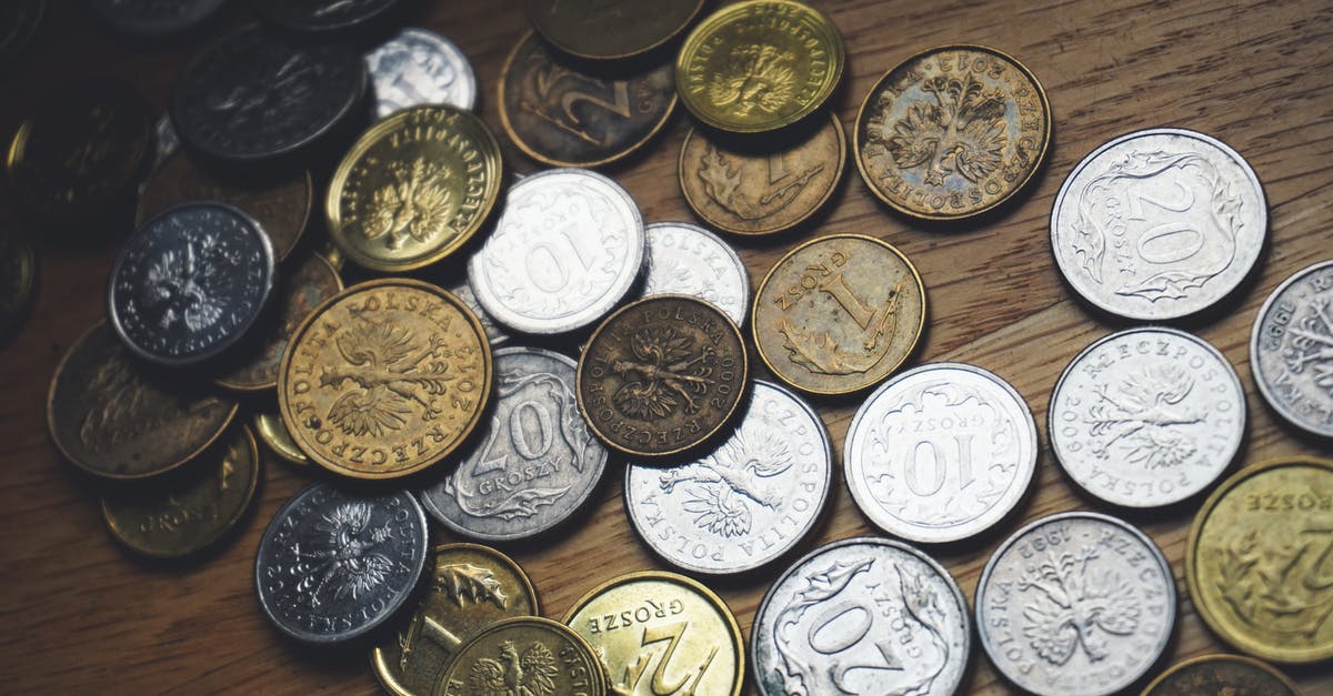 What is the point of collecting coins after all upgrades? - Close-up of Coins on Table What is the point of collecting coins after all upgrades? - Close-up of Coins on Table