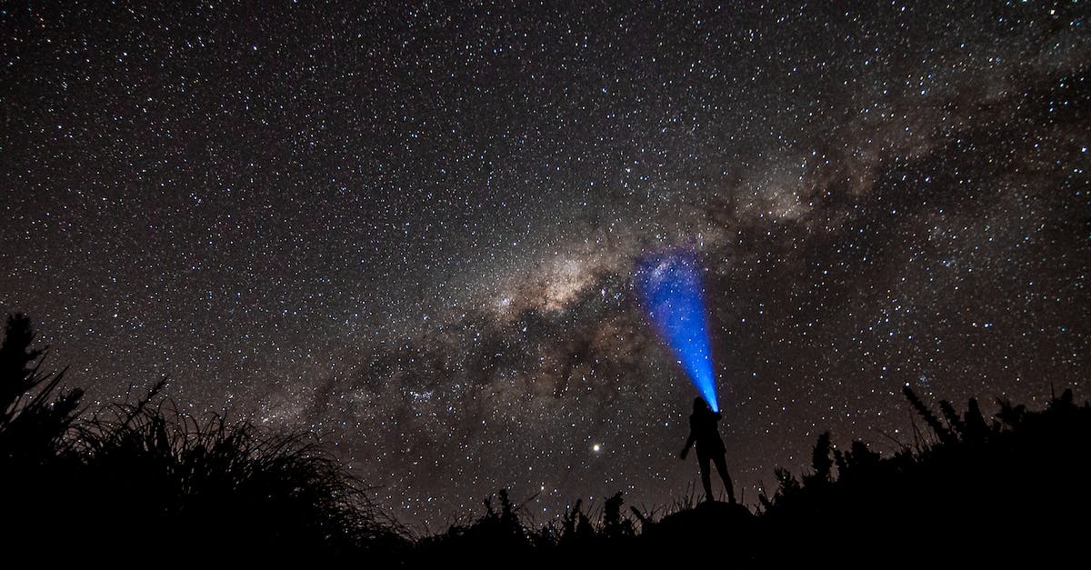 What is the point of stars at the end of races? - Person with Blue Flashlight Pointing at Stars