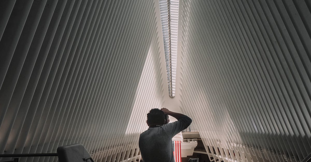 What is the rules for colonial nations taking my new colony territories? - Back view of unrecognizable man standing and taking photo of contemporary World Trade Center Transportation Hub located in New York What is the rules for colonial nations taking my new colony territories? - Back view of unrecognizable man standing and taking photo of contemporary World Trade Center Transportation Hub located in New York