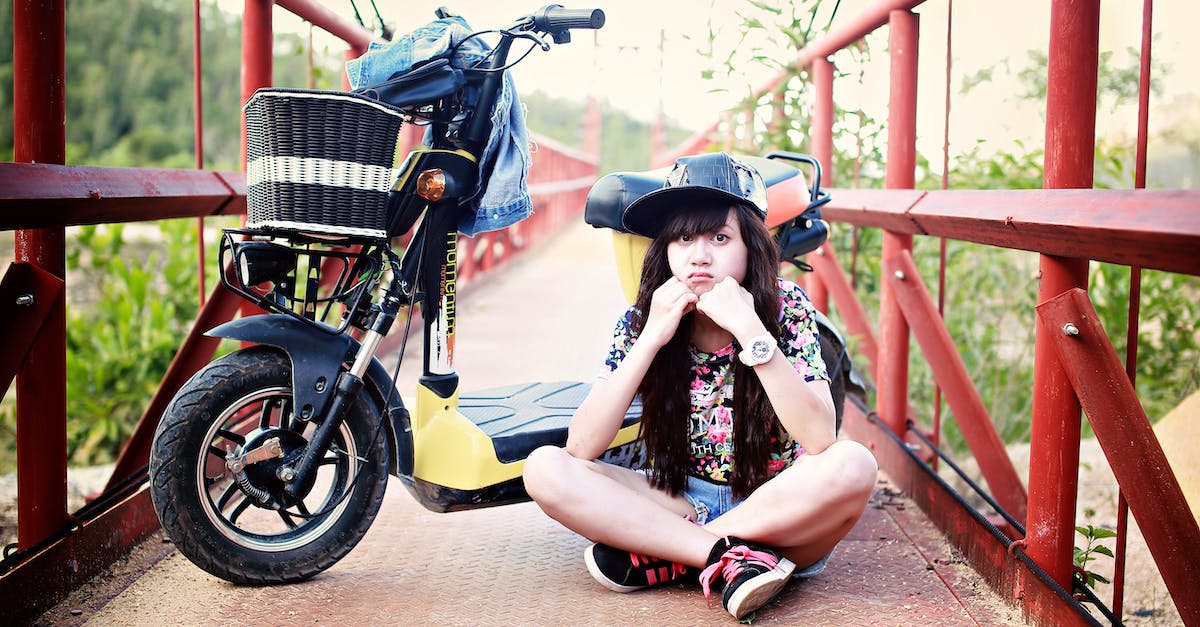 What is the single player level cap in Dragon Age: Inquisition - Woman Sitting on Bridge With Motor Scooter